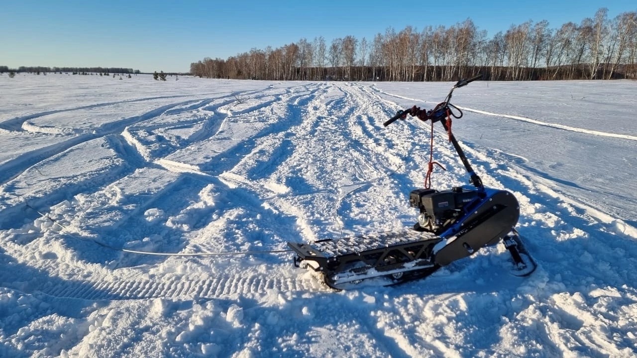 Мотосноуборд